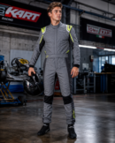 Custom 2026 kart racing suit, go-kart suit, motorsport racing overall, professional racing suit, karting apparel, racing driver suit, FIA style kart suit, sublimated racing suit, sponsor logo racing suit, lightweight karting suit, breathable racing overall, padded motorsport suit, custom racing overalls, premium kart racing gear, Monster Energy suit, McLaren racing suit, Audi Sport suit, black racing suit, orange racing suit, racing jumpsuit, kart driver apparel